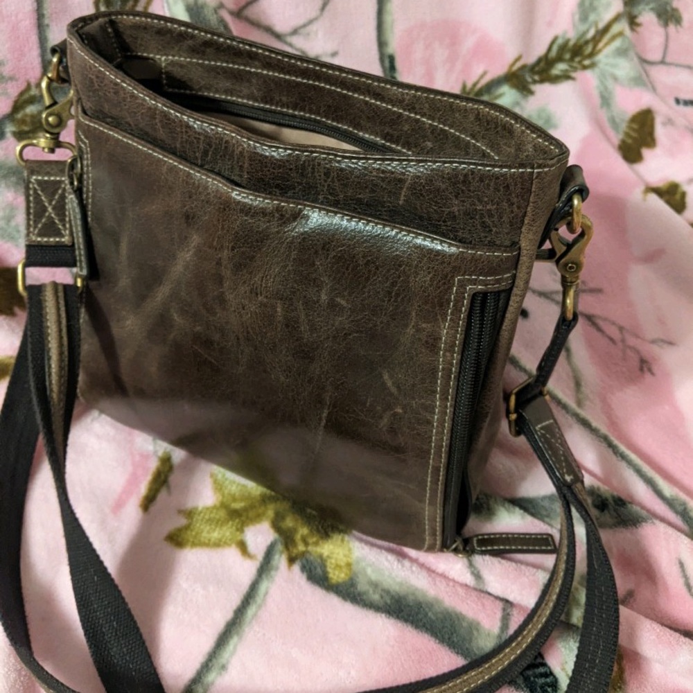 "Gun Totin Mama's" Buffalo hide concealed carry purse.